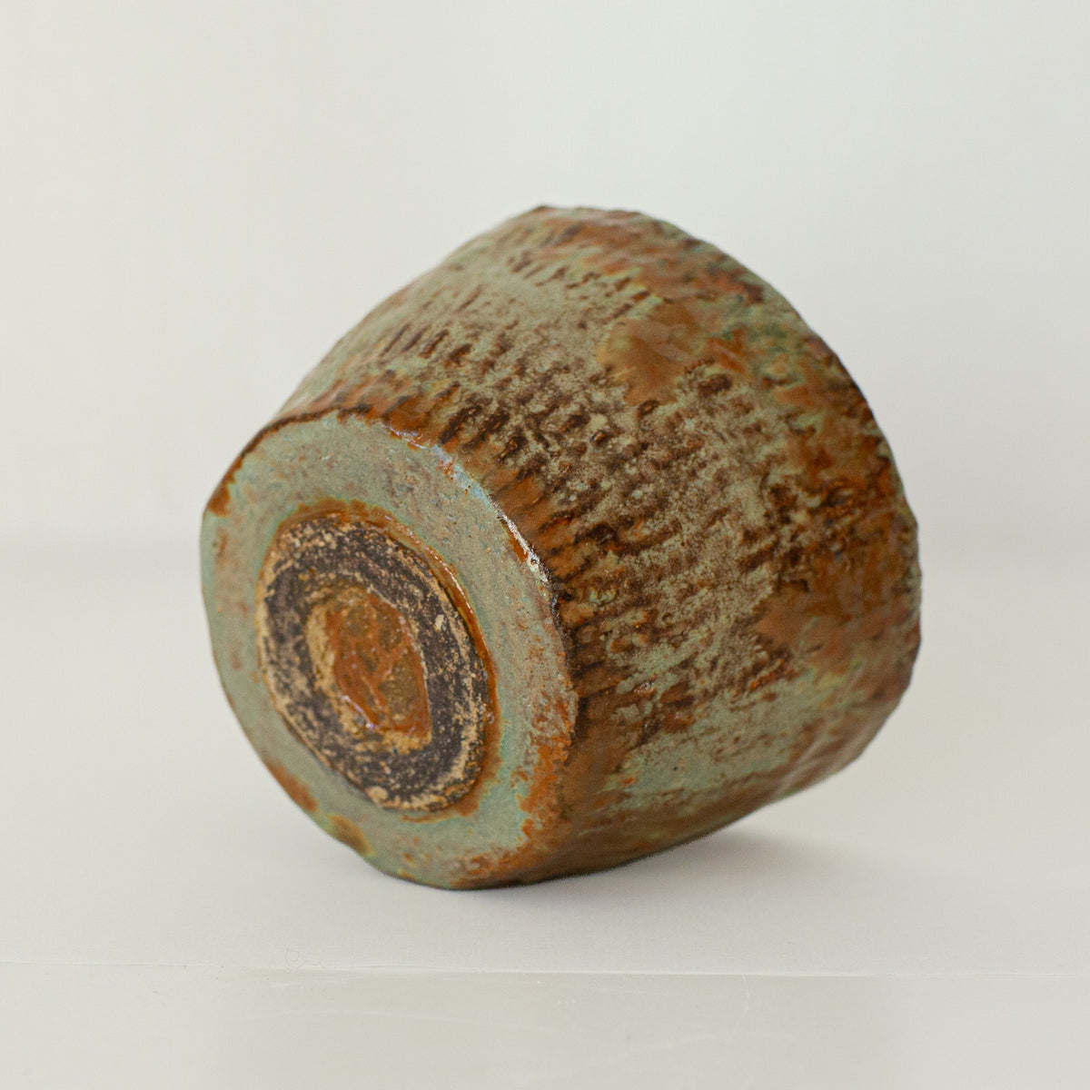 Earth Cup no. 01 handmade stoneware cup by artist Tania Ruda, base view