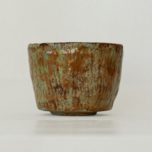 Earth Cup no. 01 handmade stoneware cup by artist Tania Ruda, front view