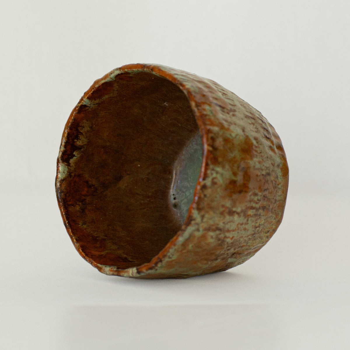 Earth Cup no. 01 handmade stoneware cup by artist Tania Ruda, side view