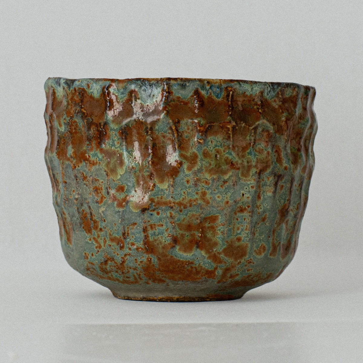 Earth Cup no. 05 handmade stoneware cup by artist Tania Ruda, front view