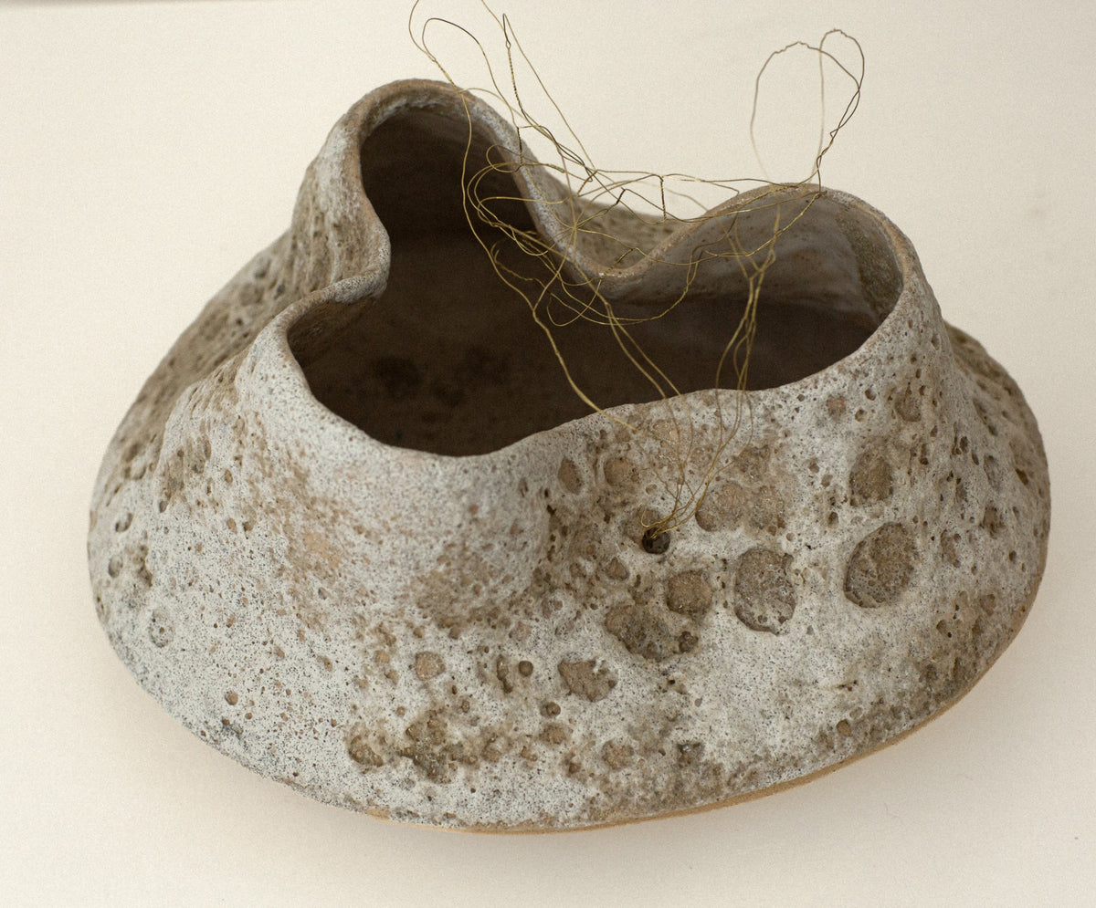 Sculptural ceramic vessel viewed from above